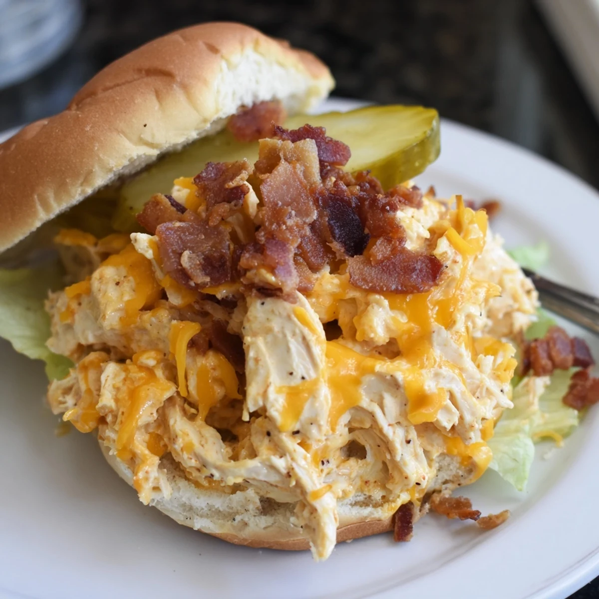 Warm Crack Chicken Sandwiches spooned hot from baking dish, melty cheddar oozing