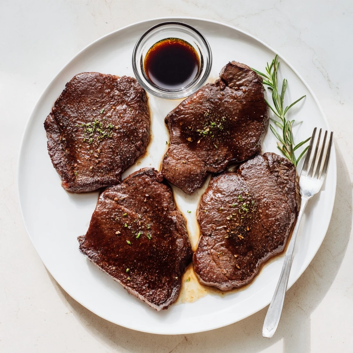 Bowl of Steak Marinade with rosemary, brown sugar, citrus scent