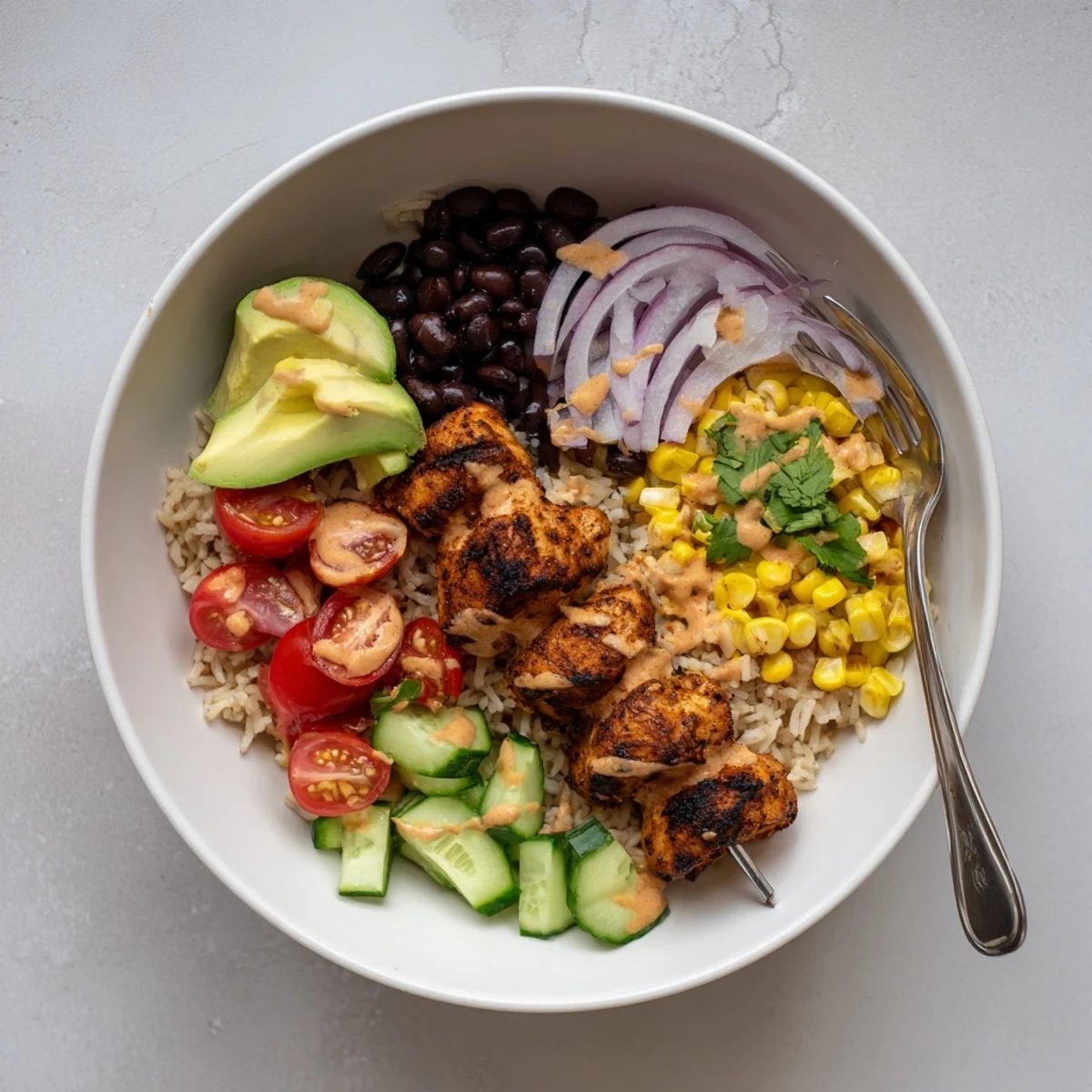 Smoky Chicken Skewer Bowl Recipe with charred chicken, creamy avocado, bright lime