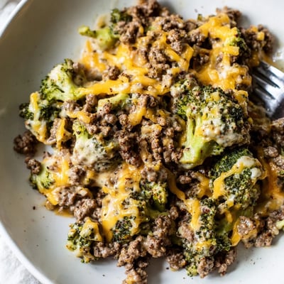 Freshly prepared Keto Hamburger Broccoli Skillet served hot in a skillet with steam rising from the tender broccoli.